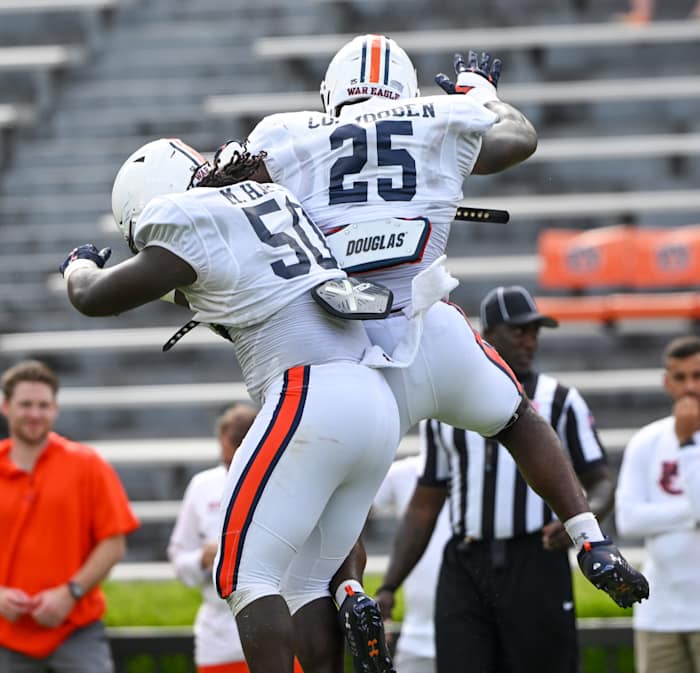 Marcus Harris (50), Colby Wooden (25)Auburn football scrimmage on Friday, Aug. 19, 2022 in Auburn, Ala. Todd Van Emst/AU Athletics